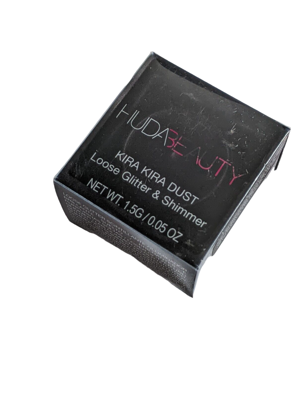 huda-beauty-kira-kira-dust-loose-glitter-eyeshadow-purple-1-1-g-1723473089 Huda Beauty, Kira Kira Dust, Losse glitter oogschaduw, Paars, 1.1 g - Afbeelding 1